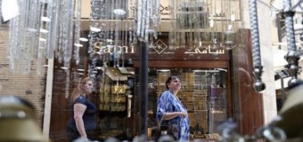 Gold near multi-year lows as U.S. data supports rate-hike view