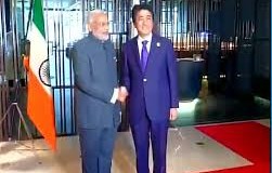 ASEAN goof-up: Modi meets Abe, in front of an upside down Tricolour